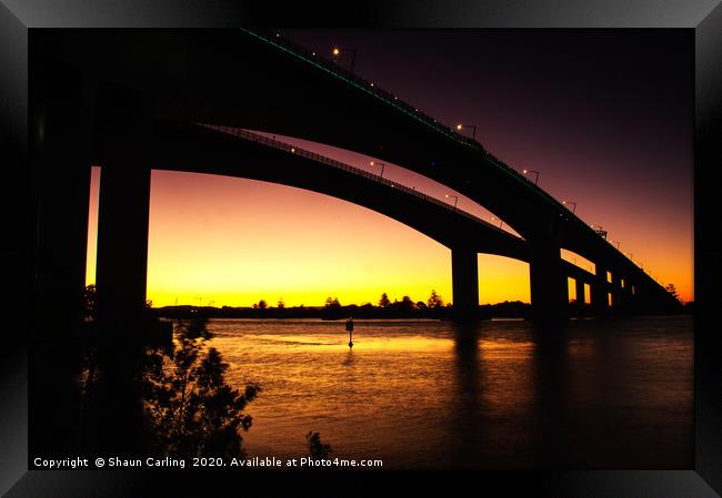 Sunset Over The Sir Leo Hielscher Bridges. Framed Print by Shaun Carling