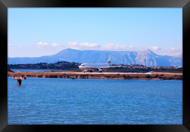 fly airplane taking off Framed Print by M. J. Photography