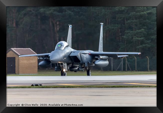 F-15E taxing to runway at RAF Lakenheath Framed Print by Clive Wells