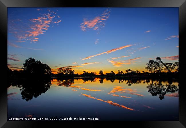 Sunset Over Lake Apex Framed Print by Shaun Carling