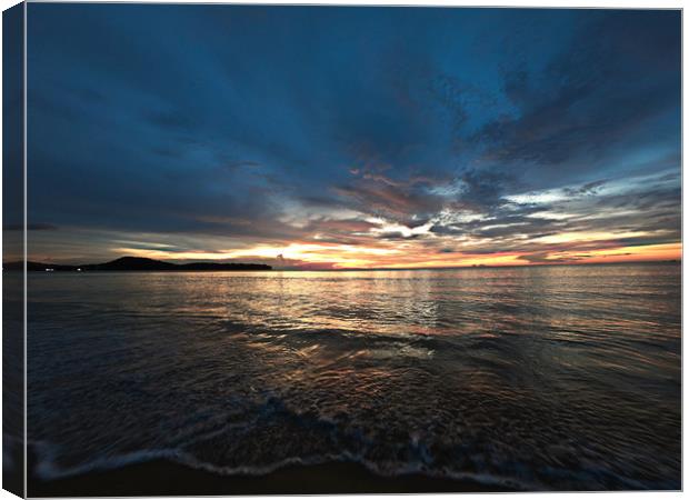 Sunset on a thai beach Canvas Print by jason jones