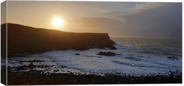 Sunset over Giant's Causeway Canvas Print by Judy Puddifoot