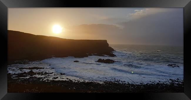 Sunset over Giant's Causeway Framed Print by Judy Puddifoot