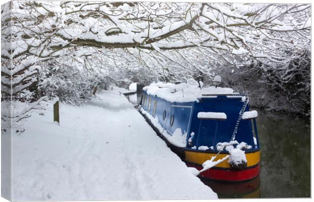 Deep snow lines a canal near Oxford Canvas Print by Alan Hill