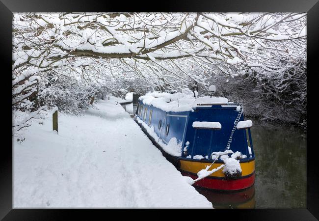 Deep snow lines a canal near Oxford Framed Print by Alan Hill