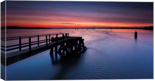 Sunset over Poole Harbour at Hamworthy pier Canvas Print by Alan Hill
