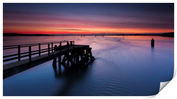 Sunset over Poole Harbour at Hamworthy pier Print by Alan Hill