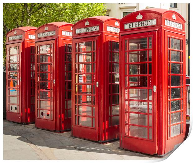 Four red telephone boxes in London Print by Alan Hill