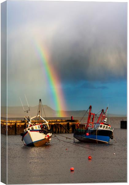 Rainbow over fishing boats at Lyme Regis Canvas Print by Alan Hill