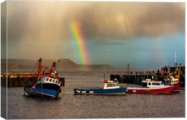Rainbow over fishing boats at Lyme Regis Canvas Print by Alan Hill