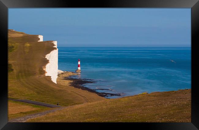 Beachy Head Lighthouse and calm seas Framed Print by Alan Hill