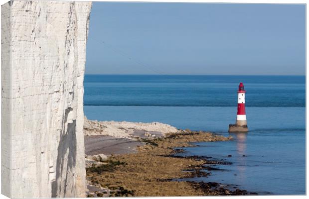 Beachy Head Lighthouse and calm seas Canvas Print by Alan Hill