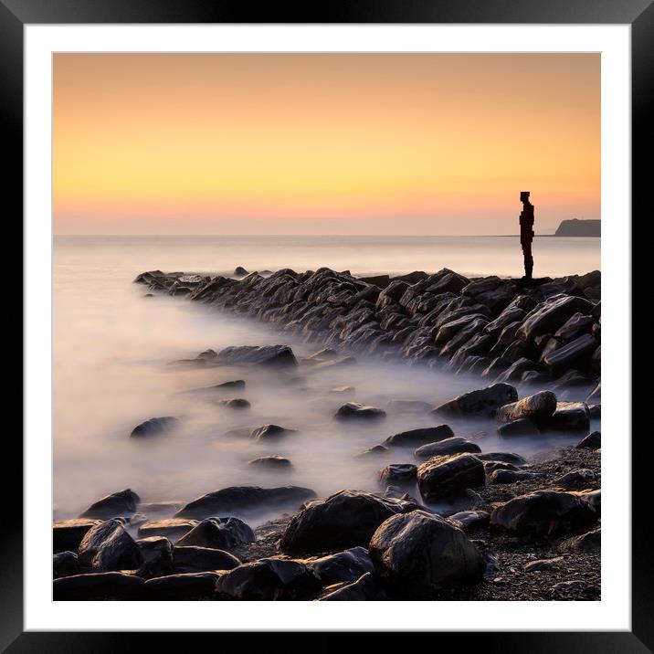Lone figure stands looking out to sea Framed Mounted Print by Alan Hill
