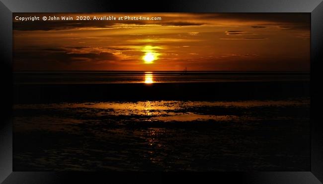 Irish Sea at Sunset Framed Print by John Wain