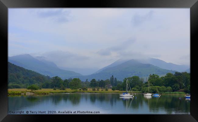 Lakes and mountains Framed Print by Terry Hunt