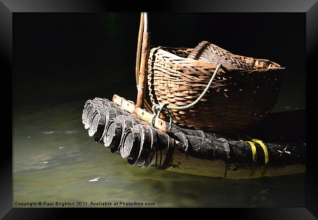 Bamboo raft for Cormorant fishing. Framed Print by Paul Brighton