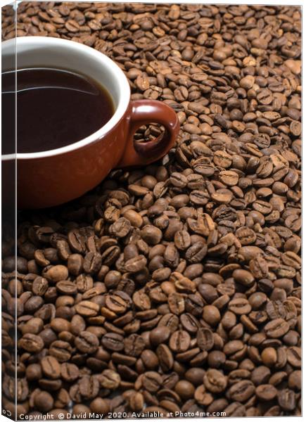 Coffee beans surrounding Coffee cup. Canvas Print by David May