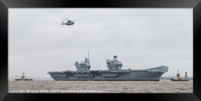 Merlin helicopter overflies HMS Prince of Wales Framed Print by Jason Wells