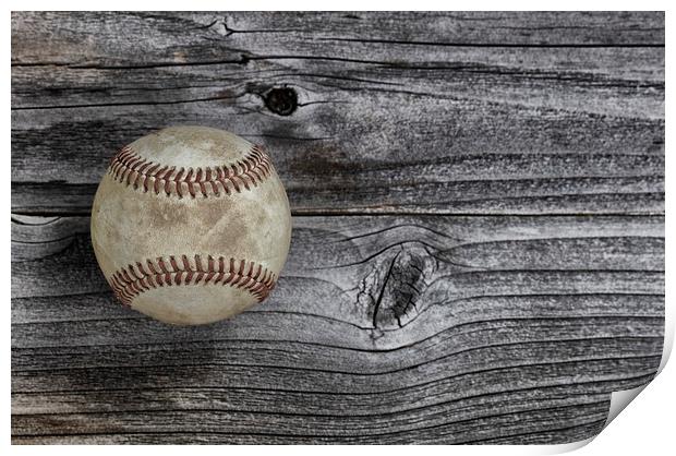 Single used baseball on vintage wooden background. Print by Thomas Baker