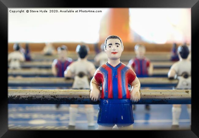 A Foosball or Table Football Player Framed Print by Steve Hyde