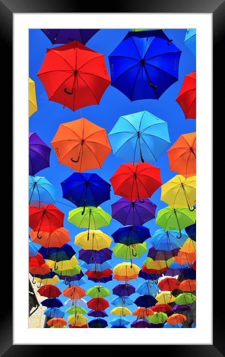 umbrella street, and it’s magical. Framed Mounted Print by M. J. Photography