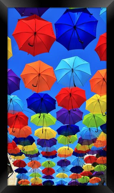 umbrella street, and it’s magical. Framed Print by M. J. Photography