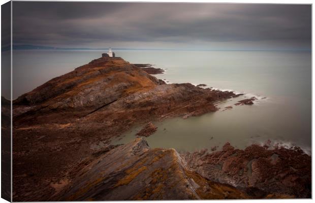Calm seas at Mumbles lighthouse Canvas Print by Leighton Collins