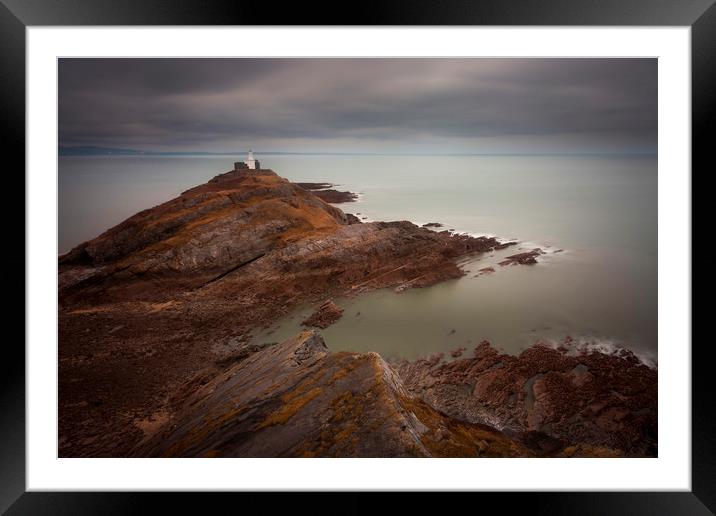 Calm seas at Mumbles lighthouse Framed Mounted Print by Leighton Collins
