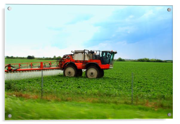 Tractor spraying wheat field with sprayer during s Acrylic by M. J. Photography