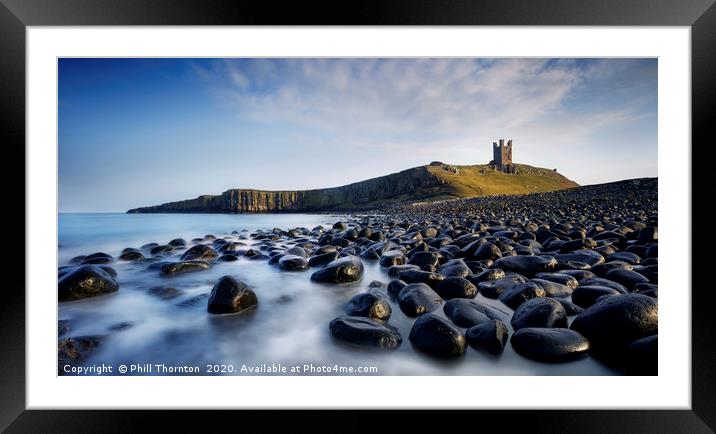 Dunsanburgh Castle and the North Sea. Framed Mounted Print by Phill Thornton