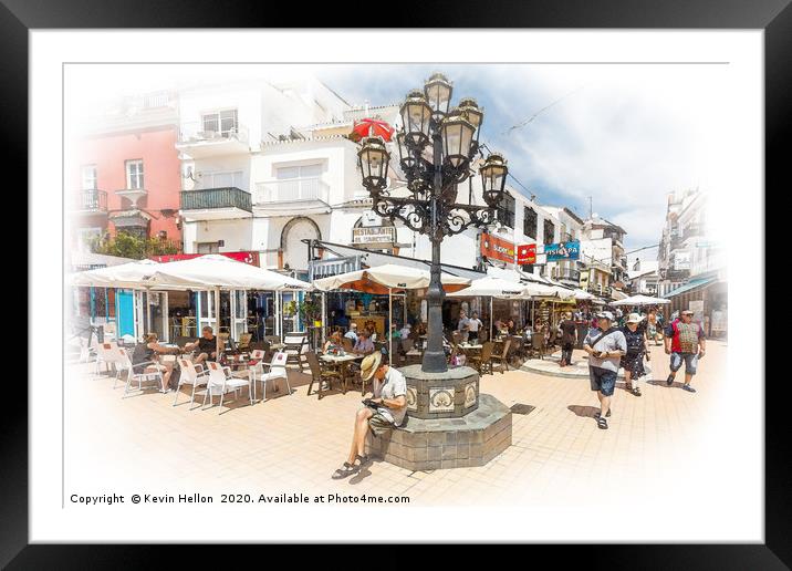 Shoppers in a pedestrianised street. Framed Mounted Print by Kevin Hellon
