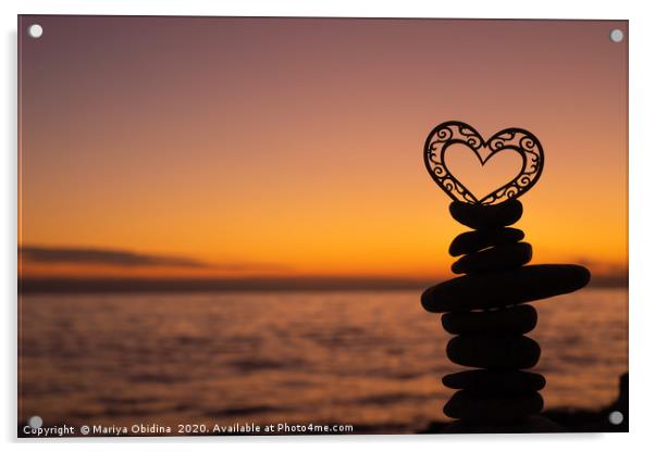 Heart on stones on the beach at sunset. Acrylic by Mariya Obidina