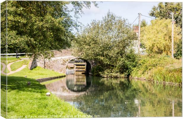 Bridge over  the Grand Union canal  Canvas Print by Kevin Hellon