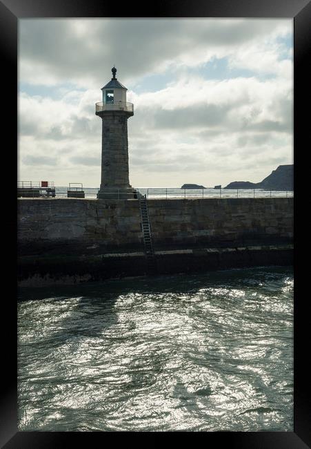 Lighthouse at Whitby, North Yorkshire, England Framed Print by Andrew Kearton