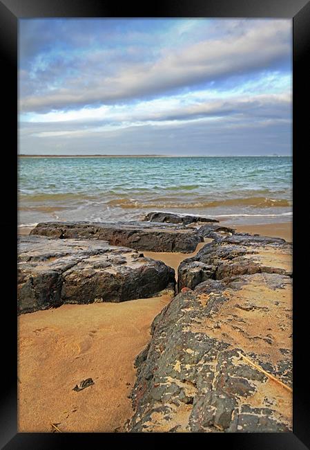 Sea Stones Framed Print by J Biggadike