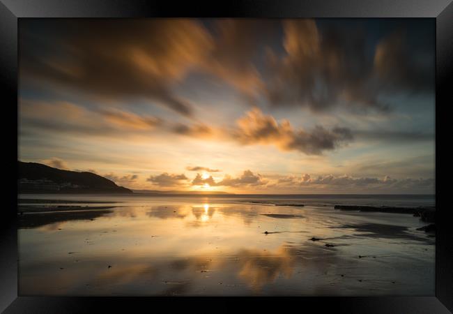 Moody beach sunset at Westward Ho Framed Print by Tony Twyman