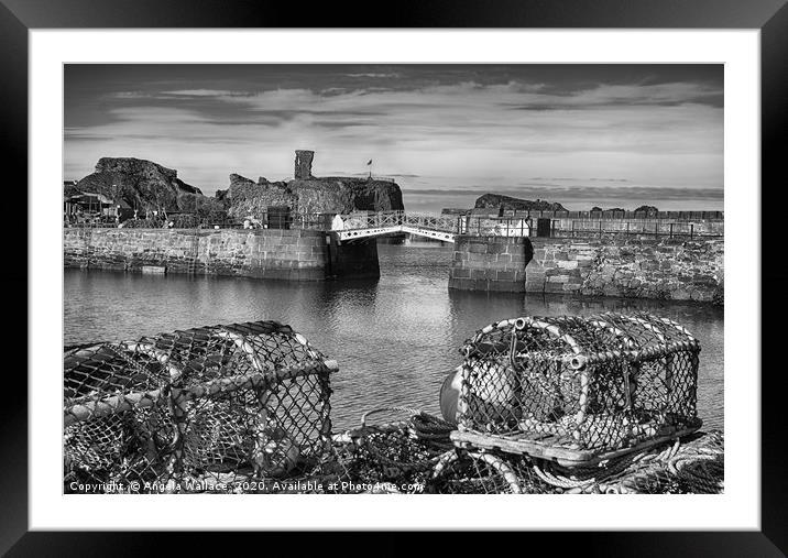 Black and white Lobster posts at Dunbar Castle Framed Mounted Print by Angela Wallace