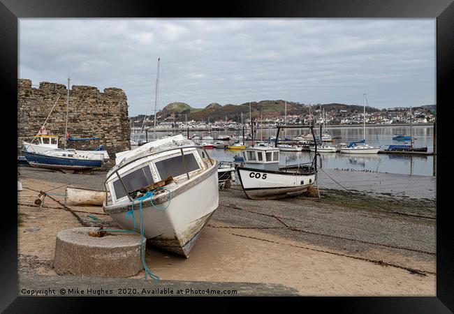 Boats at rest Framed Print by Mike Hughes