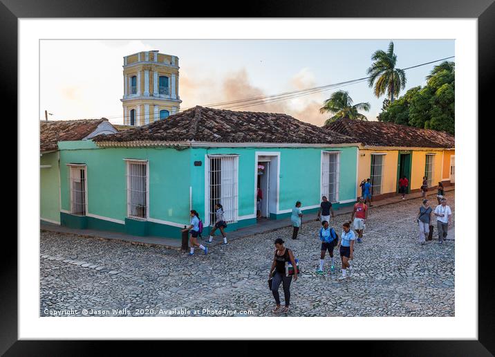 Locals on the streets of Trinidad Framed Mounted Print by Jason Wells