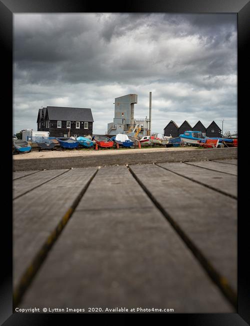 Whitstable Fishing Huts Framed Print by Wayne Lytton