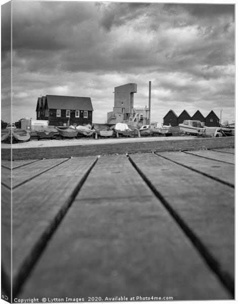 Whitstable Fishing Huts (black and white) Canvas Print by Wayne Lytton