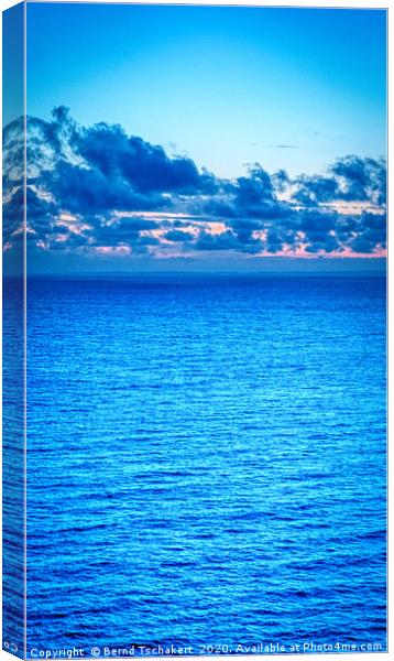Clouds over the sea, blue hour, Gower, Wales, UK Canvas Print by Bernd Tschakert