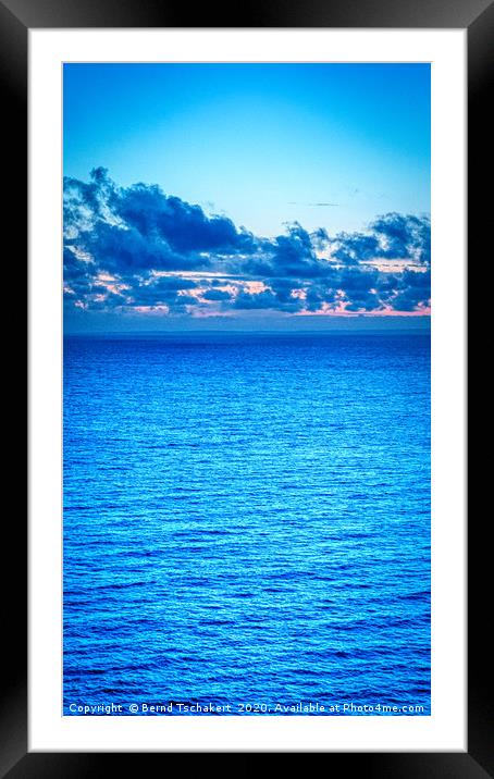 Clouds over the sea, blue hour, Gower, Wales, UK Framed Mounted Print by Bernd Tschakert