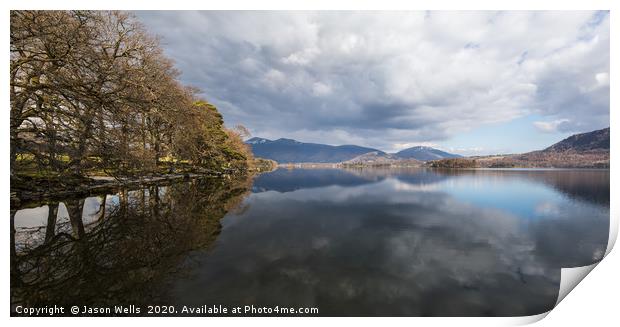 Trees and mountains reflect in Derwent Water Print by Jason Wells