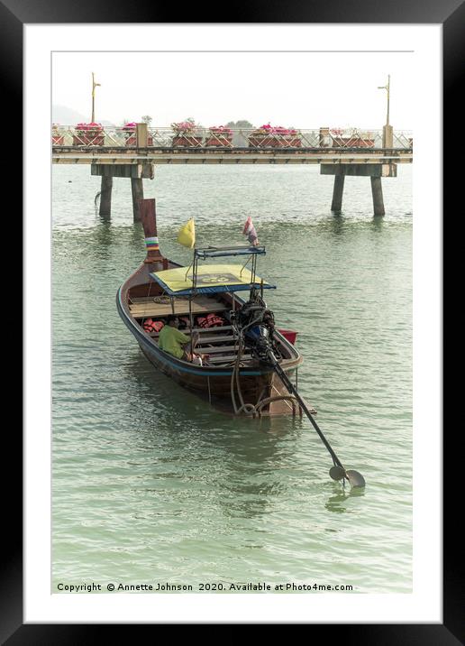 Long tail boat  at Chalong Pier Framed Mounted Print by Annette Johnson