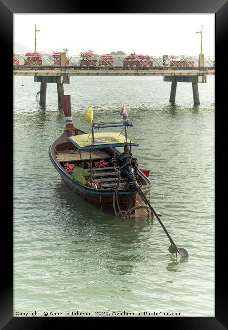 Long tail boat  at Chalong Pier Framed Print by Annette Johnson