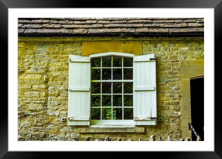 Old wooden window in a historic building, characte Framed Mounted Print by Q77 photo