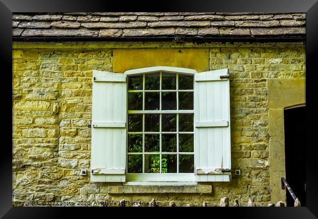 Old wooden window in a historic building, characte Framed Print by Q77 photo