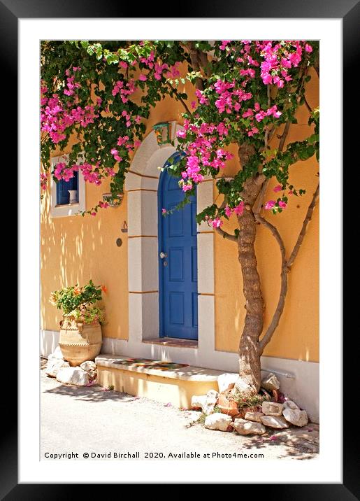 A Colourful Welcome Home in Assos. Framed Mounted Print by David Birchall
