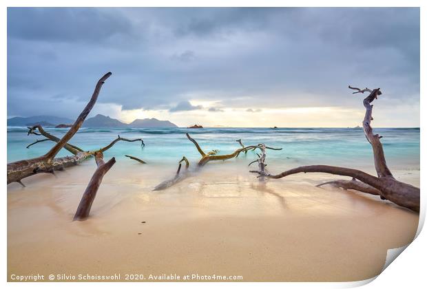 Clouds over a natural sandy beach on La Digue Print by Silvio Schoisswohl